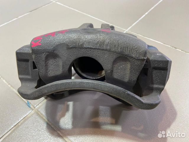 Суппорт передний левый Kia Sportage 2008