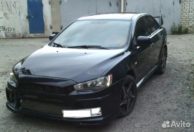 Mitsubishi Lancer 10 решетка бампера