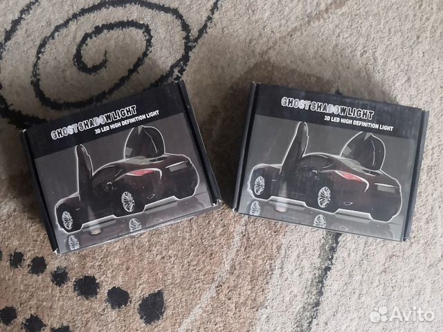 Проекция логотипа nissan в двери