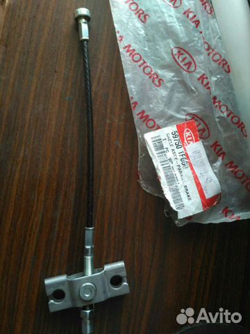 Трос стояночного тормоза Kia Sportage 2