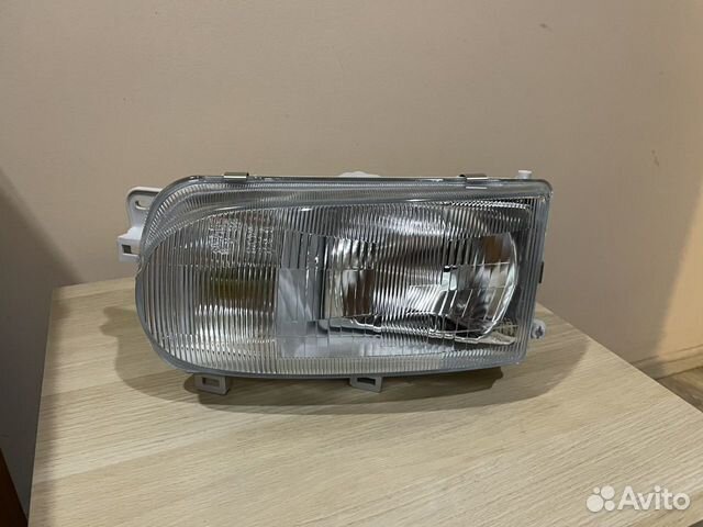 Фара левая nissan serena 91-99