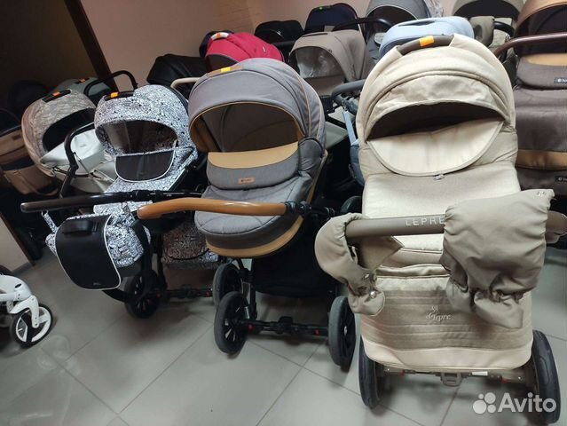 Коляска тутис