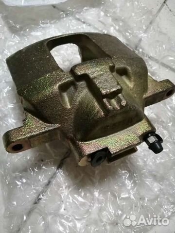 Суппорт тормозной передний левый Dodge Nitro