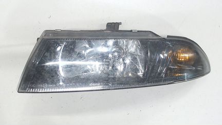 Фара (передняя) левая Mitsubishi Carisma, 2003