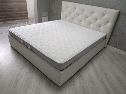 Кровать с подъемным механизмом